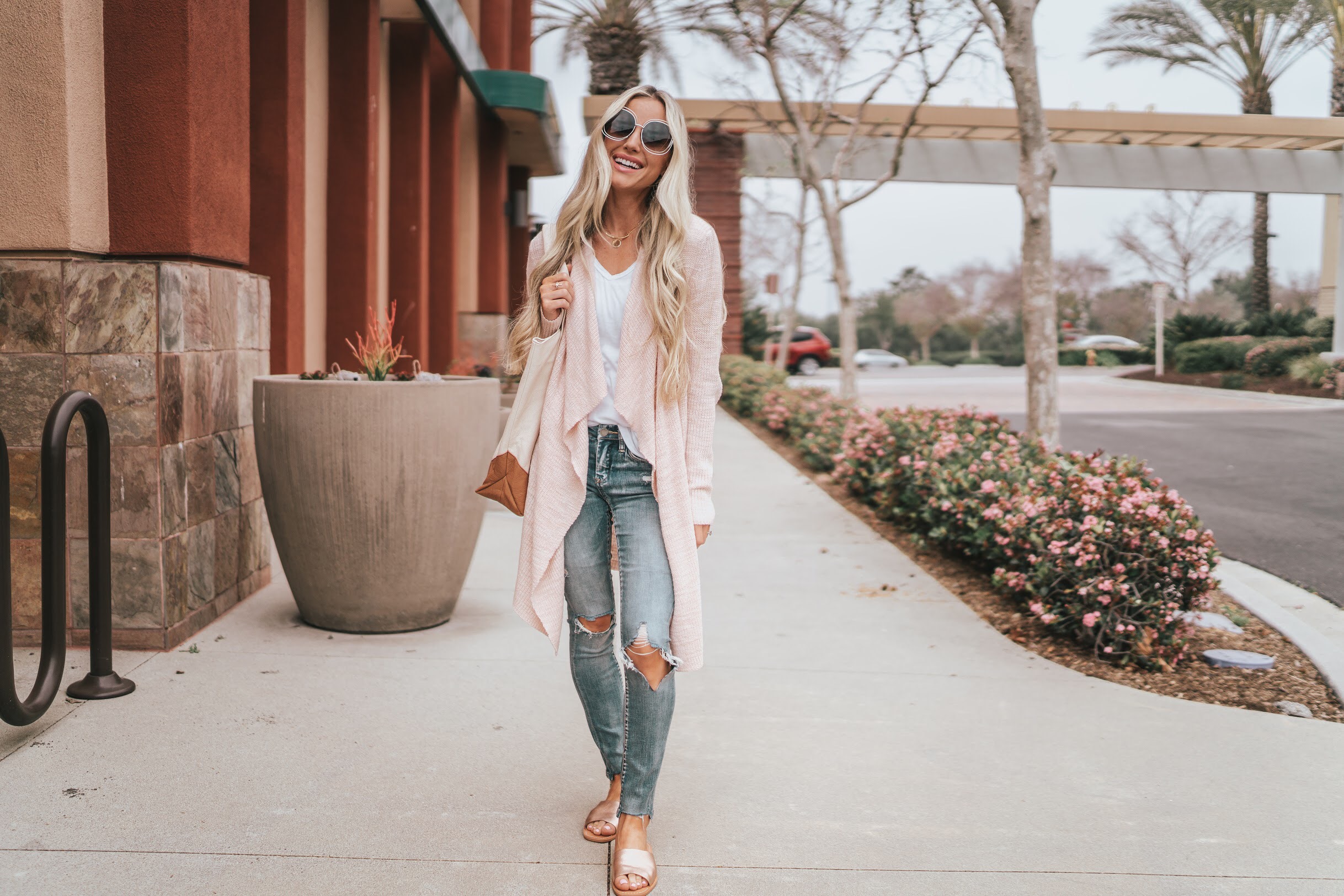 Lifestyle Blogger Katelyn Jones of A Touch of Pink Blog is wearing blank denim from the Shopbop Sale