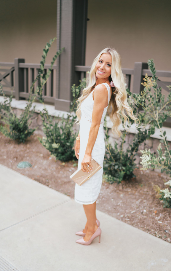 Lifestyle Blogger Katelyn Jones shares a white lace dress perfect for bridal showers from River Island